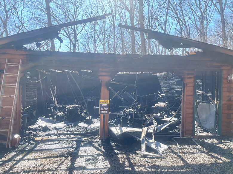 Fire heavily damages two-car garage